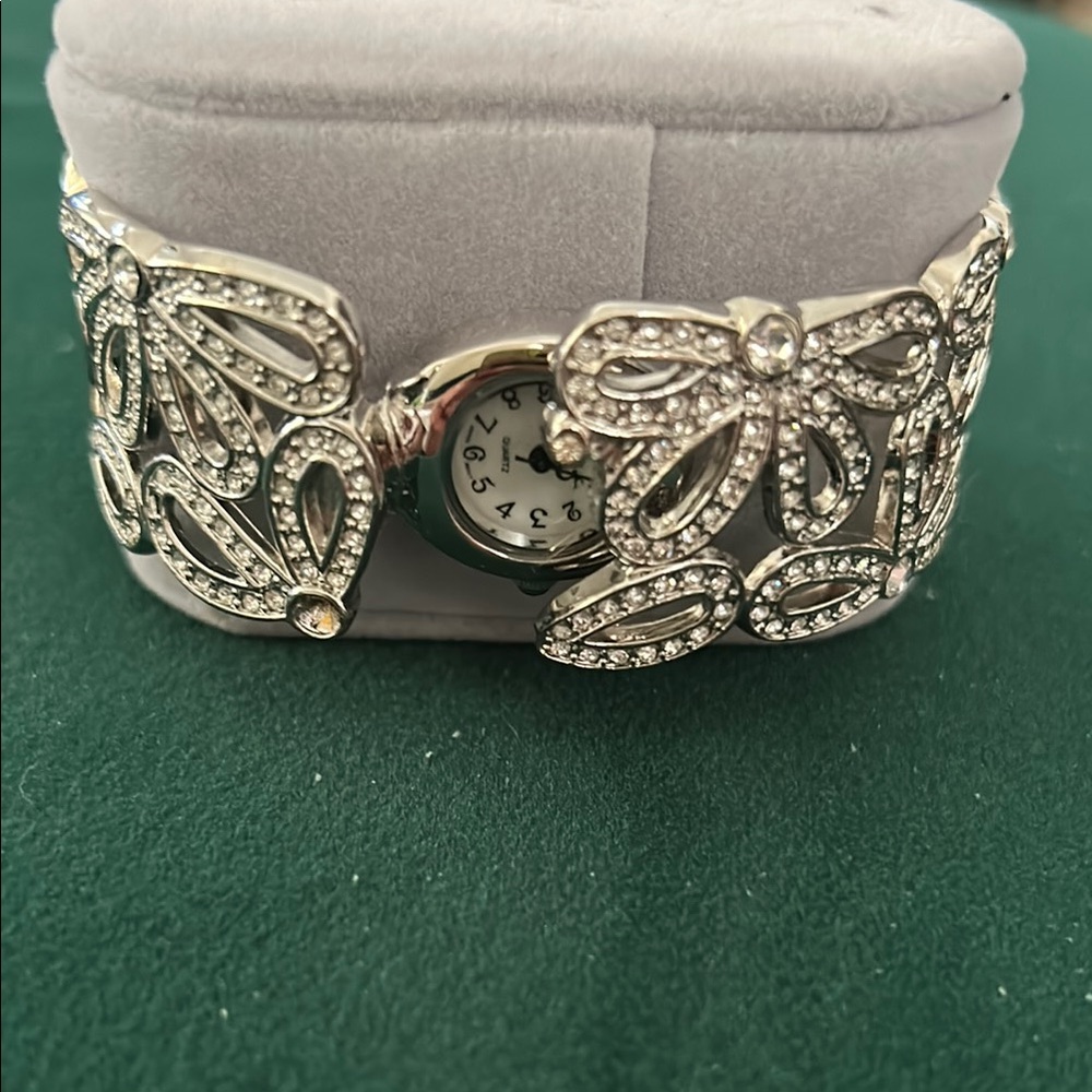 Silver Sparkling Gemstone Watch with Intricate Design